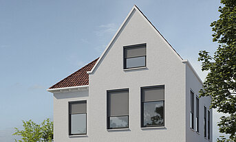 Modernes Haus mit mehreren Aussenrollos an den Fenstern als Sonnen und Sichtschutzlösung